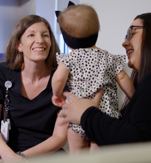 Mom, baby, and doctor