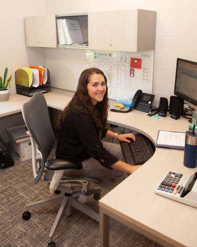 Staff Member at Desk
