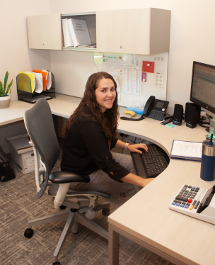 Staff Member at Desk